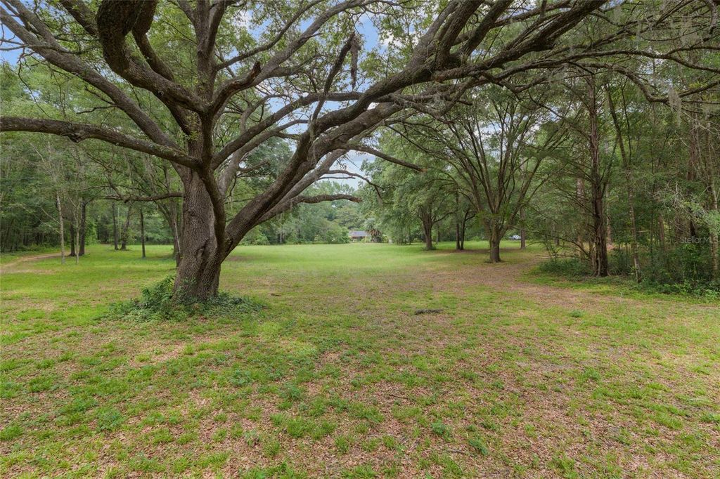 Photo of 12832 SW 14th Avenue, Newberry, FL 32669 (MLS # GC537224)