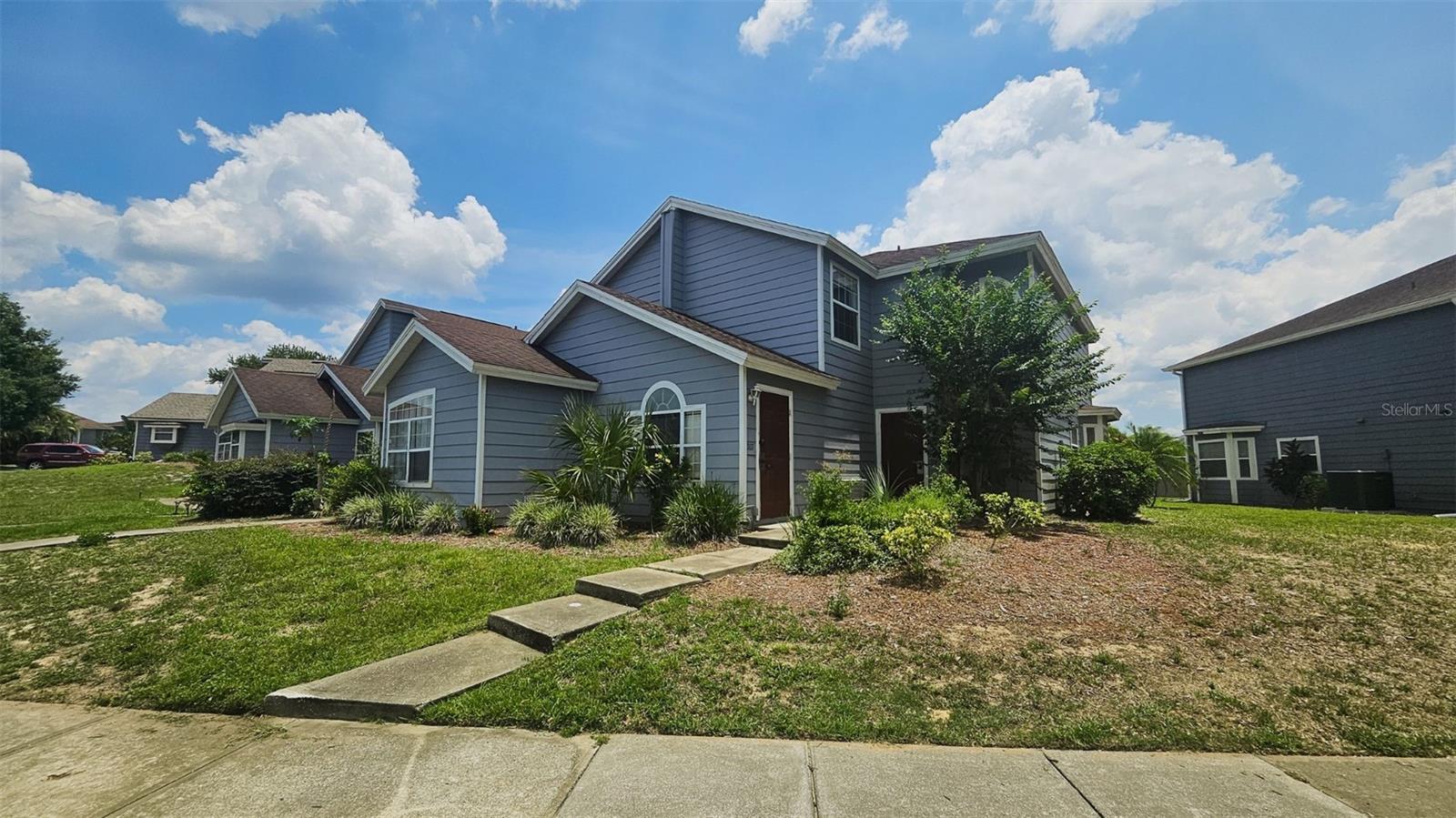 Beautiful and move-in ready 4-bedroom, 3-bath home in a highly desirable Davenport community, just 15 minutes from Disney! The main home offers 3 spacious bedrooms and 2 full bathrooms, featuring brand-new flooring and fresh paint throughout for a clean, modern look. The fourth bedroom is a private in-law suite with its own entrance, full bathroom, and independent A/C, currently rented perfect for generating extra income or providing comfortable space for extended family. Located in a resort-style community, residents enjoy access to a sparkling swimming pool, tennis courts, basketball court, fitness center, and clubhouse. This is the perfect home for those seeking flexibility, comfort, and an active Florida lifestyle. Sellers are motivated and ready to sell, making this an incredible opportunity for buyers or investors.
