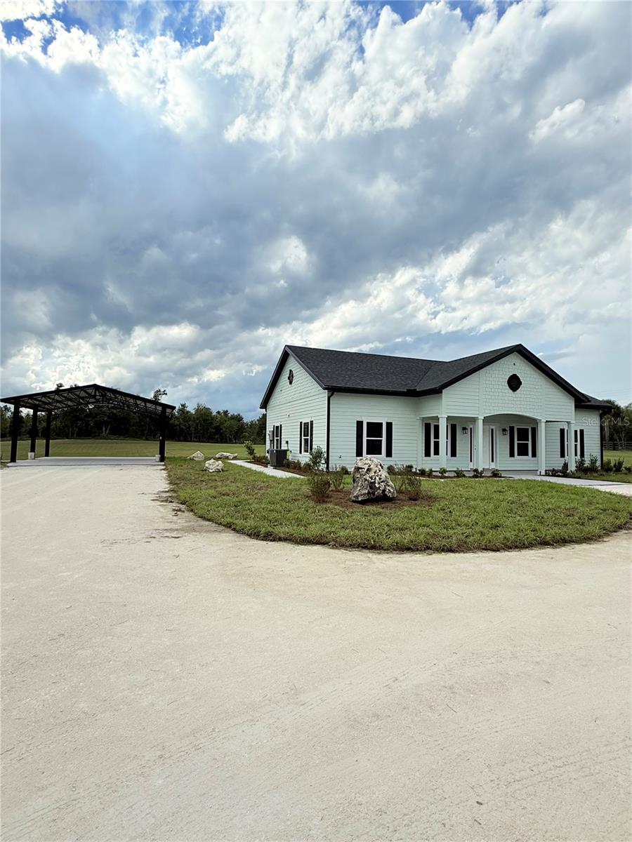 Projected to be ready October 2025! Brand New 2025 CUSTOM HOME UNDER CONSTRUCTION. This gorgeous floor plan is a 2 story, 4 bedroom/2.5 bathroom with BONUS ROOM/OFFICE on 5.01 gorgeous rolling acres in Magnolia Meadows in Gilchrist County Florida. Projected to be finished approximately Fall 2025 this home is ready for YOU! Just outside of Bell this subdivision is filled with gorgeous custom homes, paved roadways and lined with black board fencing. Minimal restrictions make this the perfect location to set roots and enjoy the slow pace of Gilchrist County. We are known for low property taxes, A rated schools and you can enjoy several crystal clear freshwater springs as well as the best boating and fishing on the Great Suwannee River, just a short drive! Call today for MORE information and take a ride out to check out this amazing home.