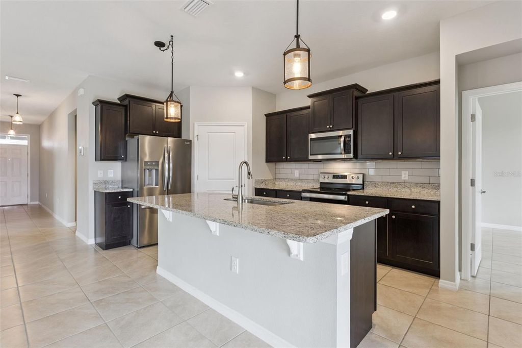 Photo of 8016 Penrose Place, Wildwood, FL 34785 (MLS # S5140082)