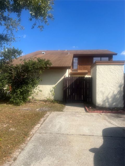 Photo of 10305 Fernglen Place, Tampa, FL 33624 (MLS # TB8450810)