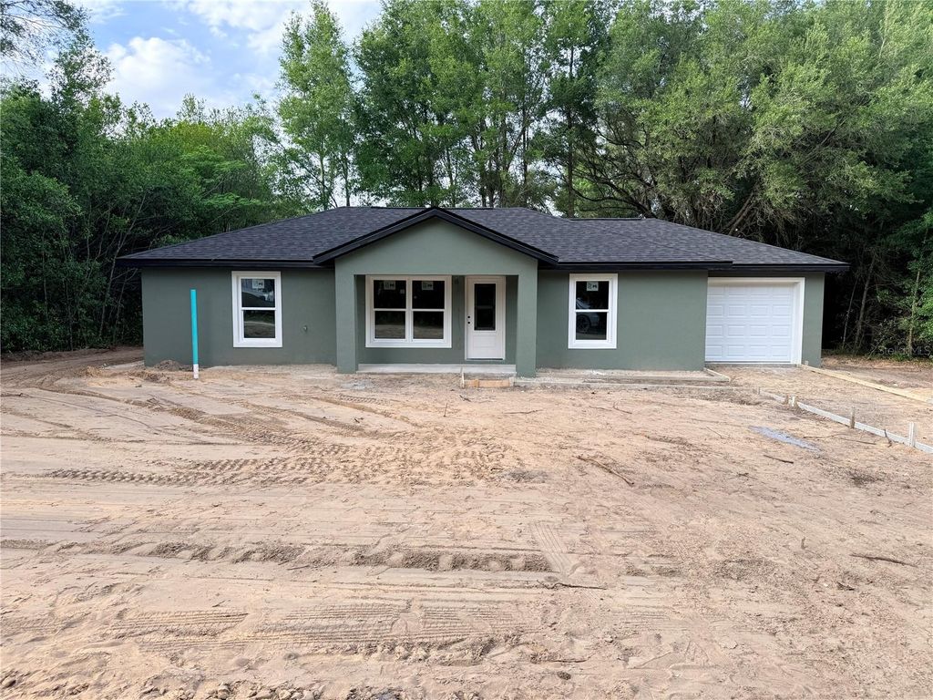 Photo of 3205 SE SE 143rd Lane, Summerfield, FL 34491 (MLS # OM723521)