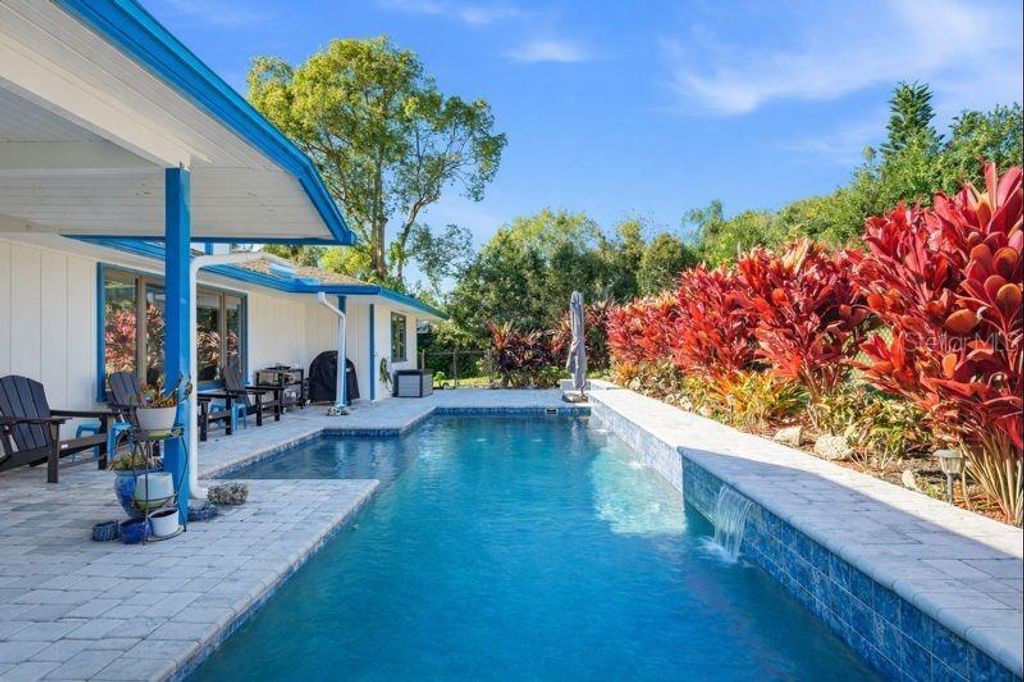 Photo of 1083 Button Bush Place, New Smyrna Beach, FL 32168 (MLS # NS1087093)