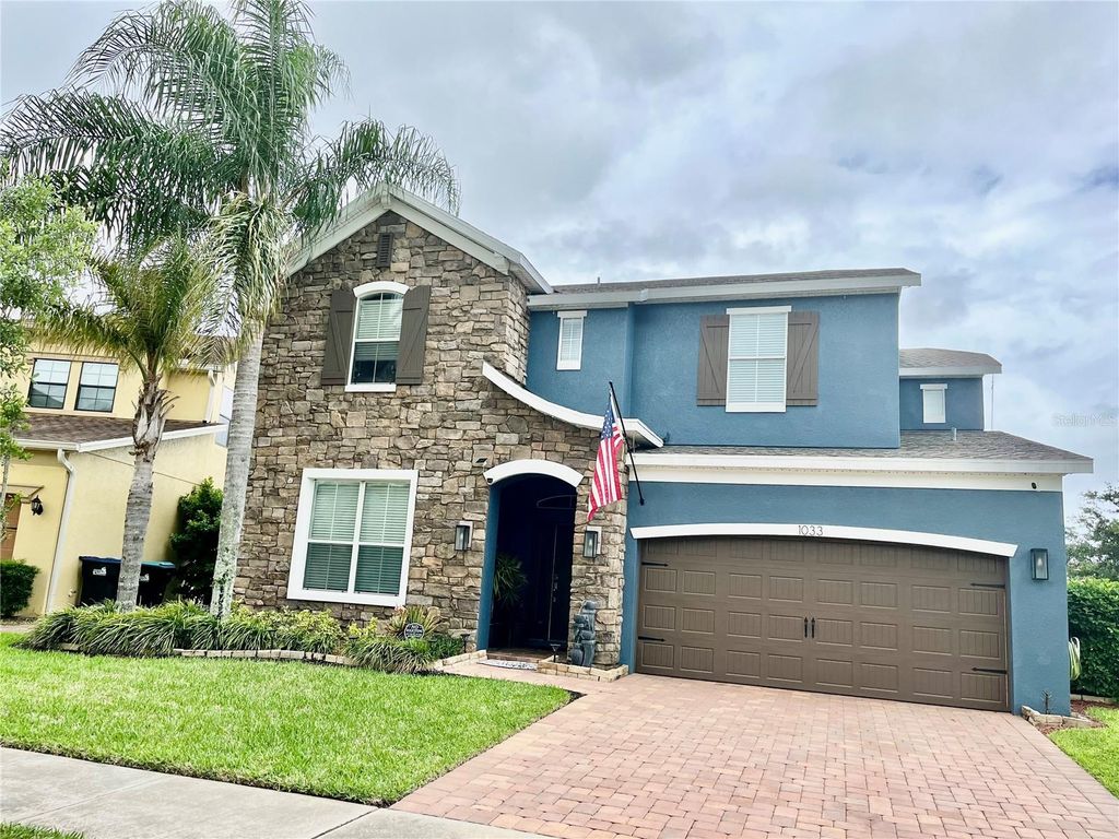 Photo of 1033 Fountain Coin Loop, Orlando, FL 32828 (MLS # O6398999)