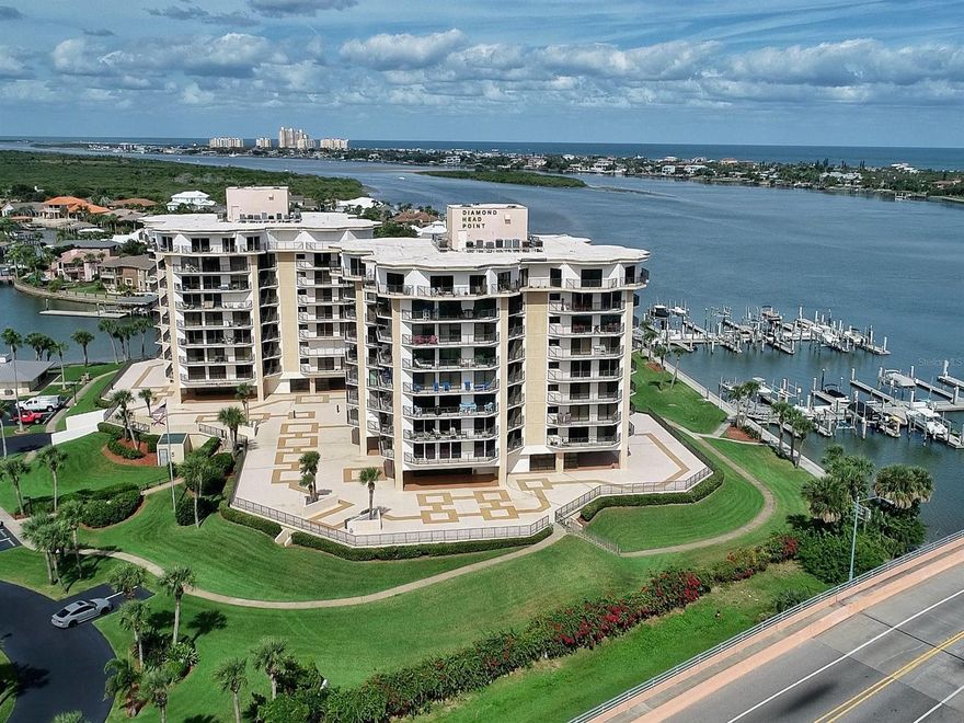 SPECTACULAR, UNOBSTRUCTED INTRACOASTAL VIEWS FROM EVERY ROOM!  THIS IMMACULATELY MAINTAINED 2 BEDROOM, 2 BATH UNIT IS LOCATED ON THE 5TH FLOOR WITH AMAZING PANORAMIC VIEWS OF THE OCEAN ON THE EAST, NORTH TO PONCE INLET, NEW SMYRNA BEACH ON THE WEST AND BEYOND.  WATCH DOLPHINS FROLICK IN THE RIVER, OSPREY SOAR RIGHT OUTSIDE YOUR BALCONY, AND SEE THE MOST UNBELIEVABLE SUNSETS IN THE EVENING. DIAMOND HEAD POINT IS LOCATED ON 5 BEAUTIFULLY LANDSCAPED ACRES THAT SITS ON THE EDGE OF THE INTRACOASTAL WATERWAY. THE COMPLEX IS COMPRISED OF TWIN 10-STORY BUILDINGS WITH EXCELLENT STRUCTURAL INTEGRITY, A 35-SLIP DEEP WATER MARINA, A NEWLY RENOVATED CLUBHOUSE & FITNESS CENTER, TENNIS AND PICKLE BALL COURTS, PRIVATE FENCED DOG PARK AND A LARGE SWIMMING POOL.  RECENT MULTI-MILLION DOLLAR REFURBISHMENT includes interior and exterior restoration, waterproofing and painting, new elevator machinery, and much, much more...ALL ASSESSMENTS PAID IN FULL BY THE CURRENT OWNERS AND BUYERS GET TO ENJOY ALL THE BENEFITS. ONLY 4 UNITS PER FLOOR PROVIDES OPTIMAL PRIVACY.  Secure gated entrance and underground parking accessible only by remote.  DEEDED RESERVED PARKING SPACE AND PRIVATE STORAGE CLOSET IN GARAGE. LARGE OPEN LIVING ROOM/DINING ROOM HAS THREE HUGE SLIDERS THAT OPEN ONTO BALCONIES AND OFFER UNFORGETTABLE WATER VIEWS.  A FLAT SCREEN TV AND BUILT-IN TV CABINET IN LIVING ROOM INCLUDED. CHEERFUL WHITE KITCHEN WITH GRANITE COUNTERS, WINDOW w/LOVELY VIEWS AND OPEN PASS THRU TO DINING AREA.  ROOMY MASTER BEDROOM WITH TWO SLIDERS & BALCONIES HAS TWO MIRRORED DOOR CLOSETS AND EN SUITE BATH w/walk-in shower.  GUEST BEDROOM HAS BUILT-IN OFFICE SO THAT WORKING FROM HOME CAN BE SAFE & CONVENIENT. JACUZZI TUB IN GUEST BATH. 7 CUSTOM INSTALLED REMOTE CONTROL HURRICANE SHUTTERS THAT OPEN AND CLOSE WITH A TOUCH OF A BUTTON on every door/window. FULL WASHER/DRYER IN UNIT. A/C 2012. New fridge in 2018. DIAMOND HEAD OFFERS A LIFESTYLE BEYOND COMPARE! ;LocationDescription: Condo ;Water: City