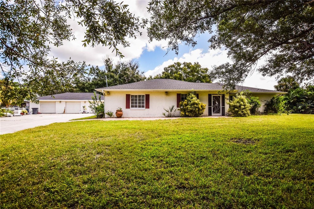 Photo of 940 Stoner Road, Englewood, FL 34223 (MLS # A4711414)