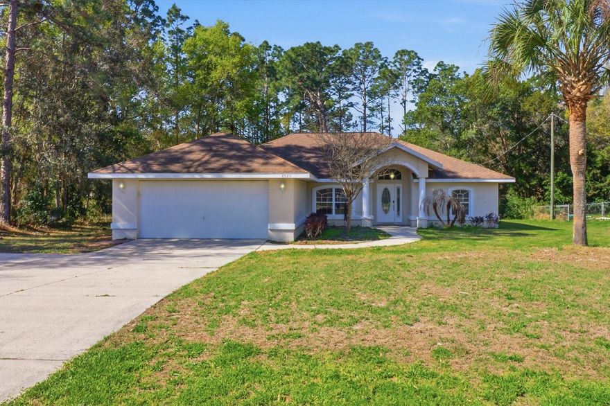 New roof to be installed prior to closing! This thoughtfully updated home features a bright, open floor plan with both a formal dining area, breakfast nook and breakfast bar offering additional seating while creating a functional space for everyday living and entertaining. The kitchen opens seamlessly to the spacious great room, highlighted by vaulted ceilings and abundant natural light. 

Recent upgrades include brand new luxury vinyl plank flooring paired with 6-inch baseboards throughout the main living areas, brand new tile flooring in the bathrooms, and fresh interior paint. The home also features newer stainless-steel appliances, along with a washer, dryer, ceiling fans, and garage door opener already in place for added convenience. Additional highlights include a newer A/C (2021) and water heater (2020).

The spacious primary suite offers two closets, including a walk-in closet, while the guest bedrooms feature generously sized closets, providing excellent storage throughout.

Enjoy early mornings and quiet evenings on the oversized screened-in lanai, overlooking a wooded backdrop with beautiful west-facing sunset views. The property also includes a large storage shed, perfect for lawn equipment, tools, or additional storage.

Located in Citrus Springs, this home offers convenient access to local schools, parks, walking and biking trails, and golf courses, with easy access to nearby shopping and dining. Just a short drive to Dunnellon and Crystal River, you can enjoy the best of both small-town charm and Florida’s natural attractions, including the Rainbow River and Gulf Coast.
