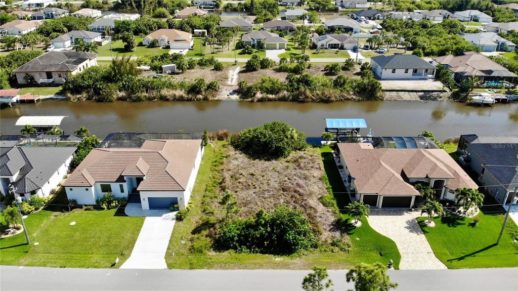 Photo of 15376 Hennipen Circle, Port Charlotte, FL 33981 (MLS # C7524094)