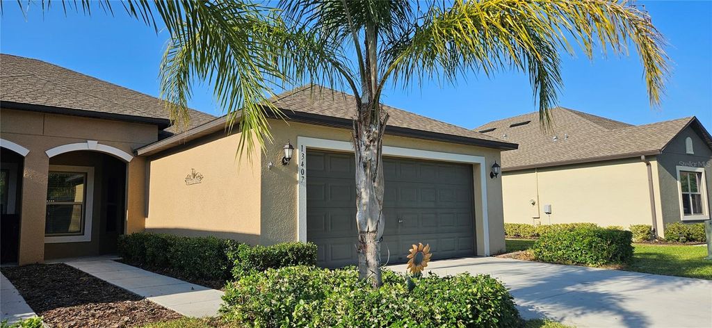 Photo of 13407 Crest Lake Drive, Hudson, FL 34669 (MLS # TB8503389)