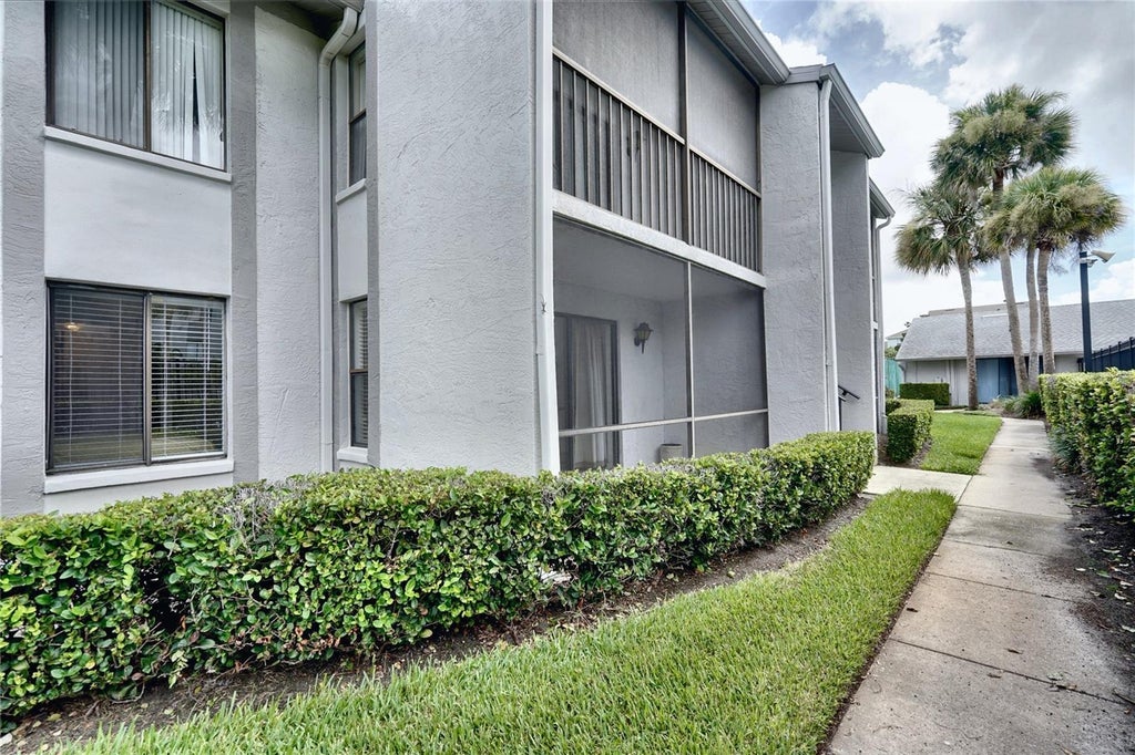 Photo of 1716 Pine Ridge Road #F1, Sanford, FL 32773 (MLS # O6431918)