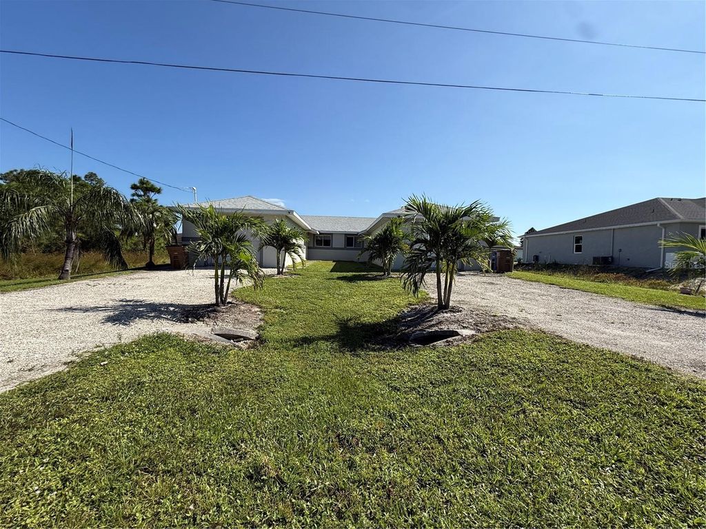 Photo of 777 Bedford Drive, Lehigh Acres, FL 33974 (MLS # TB8443002)
