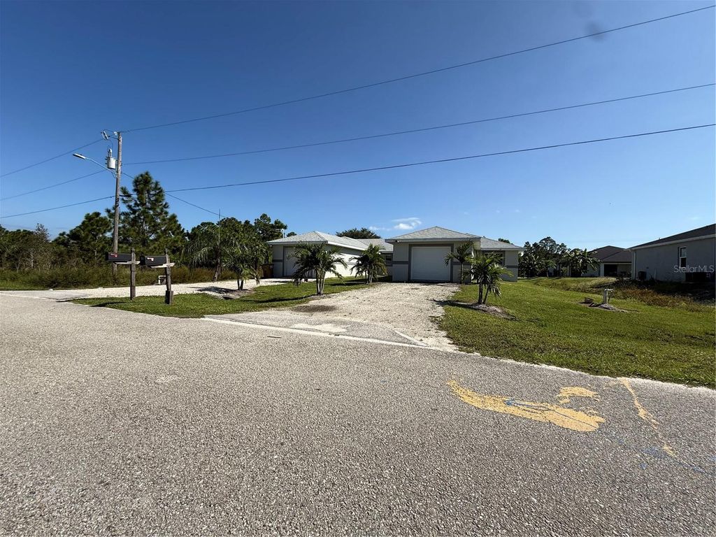 Photo of 777 Bedford Drive, Lehigh Acres, FL 33974 (MLS # TB8443002)