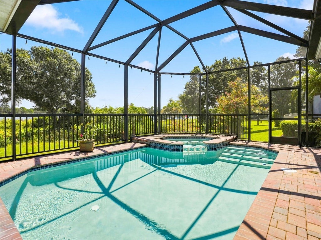 Photo of 2707 Lakebreeze Lane S, Clearwater, FL 33759 (MLS # TB8547014)