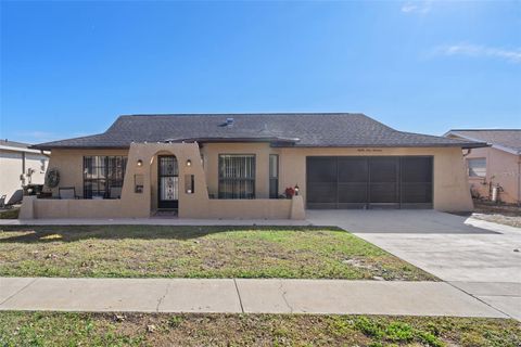 Photo of 8914 Schrader Boulevard, Port Richey, FL 34668 (MLS # W7876201)