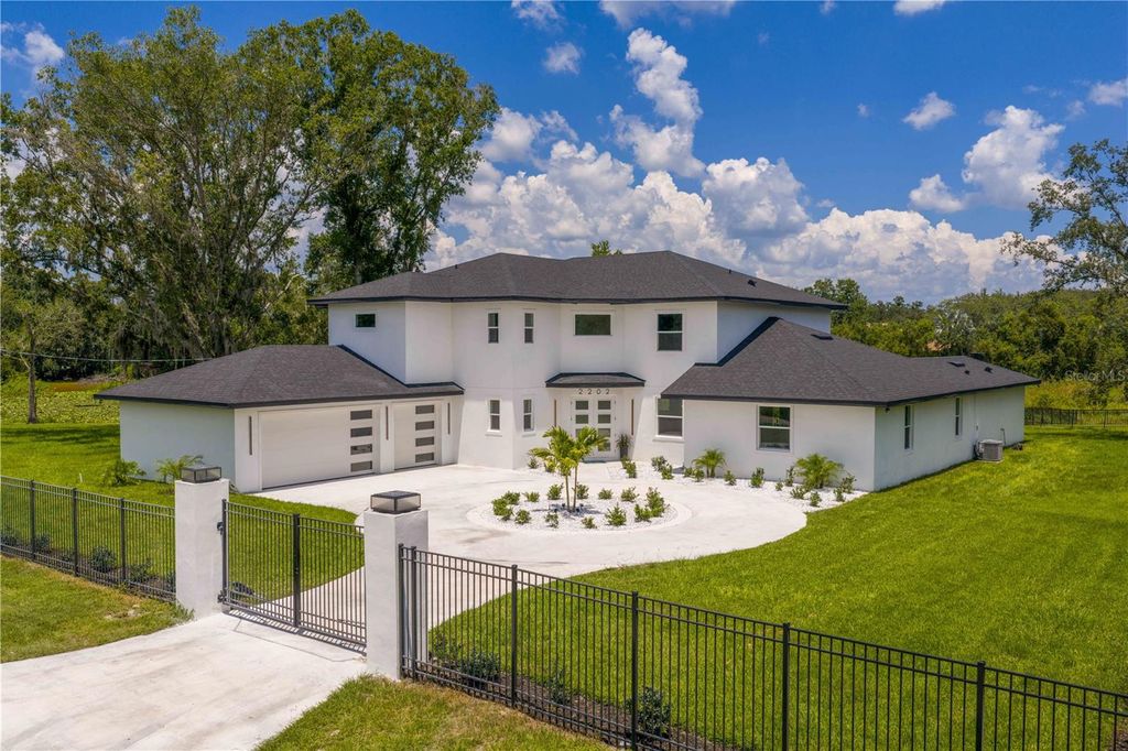 Photo of 2202 Newberger Road, Lutz, FL 33549 (MLS # TB8412647)