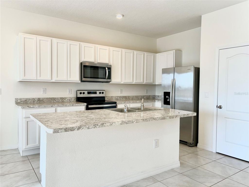 Photo of 401 Feltrim Reserve Boulevard, Davenport, FL 33837 (MLS # S5148005)