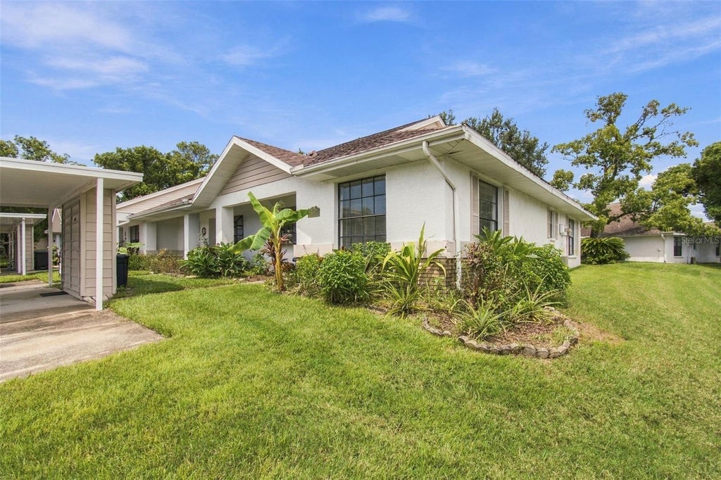 Photo of 7610 Oakmont Lane, New Port Richey, FL 34654 (MLS # W7889365)