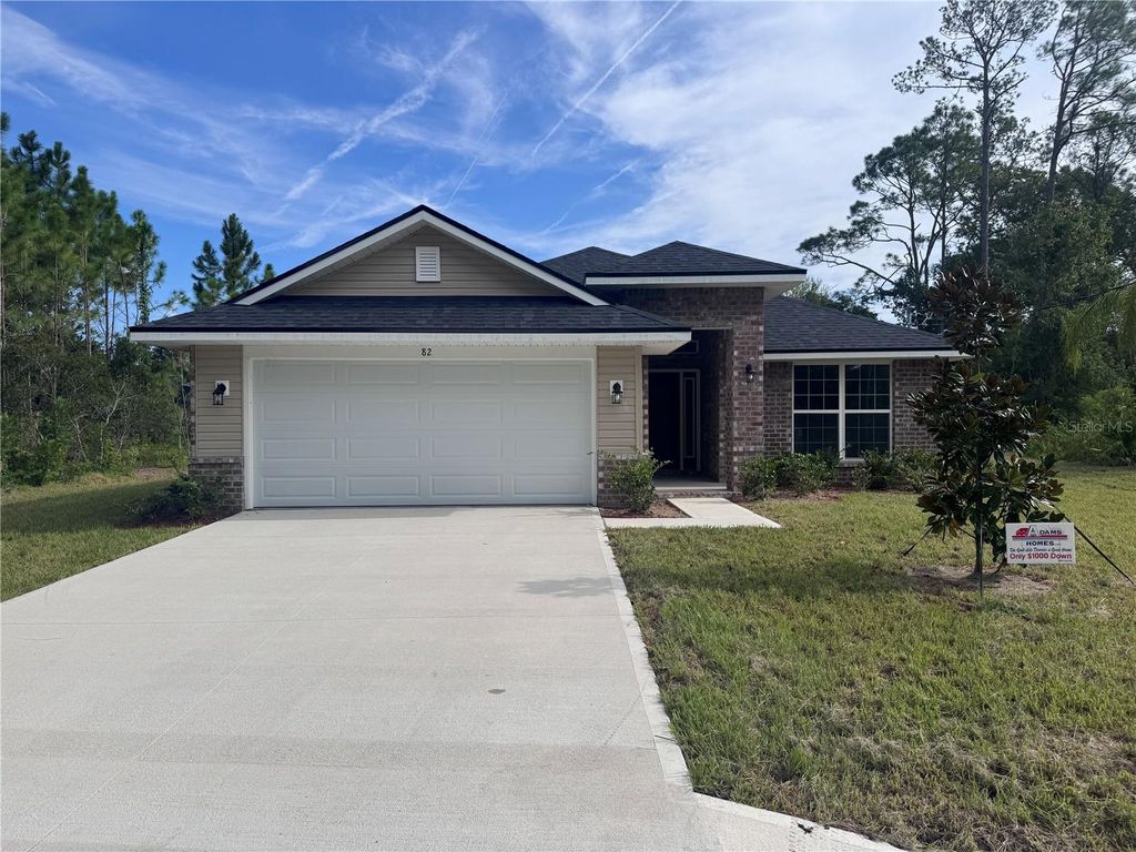Photo of 82 Bayside Dr, Palm Coast, FL 32137 (MLS # FC310552)