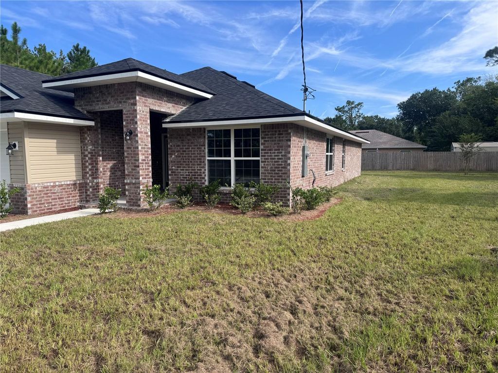 Photo of 82 Bayside Dr, Palm Coast, FL 32137 (MLS # FC310552)