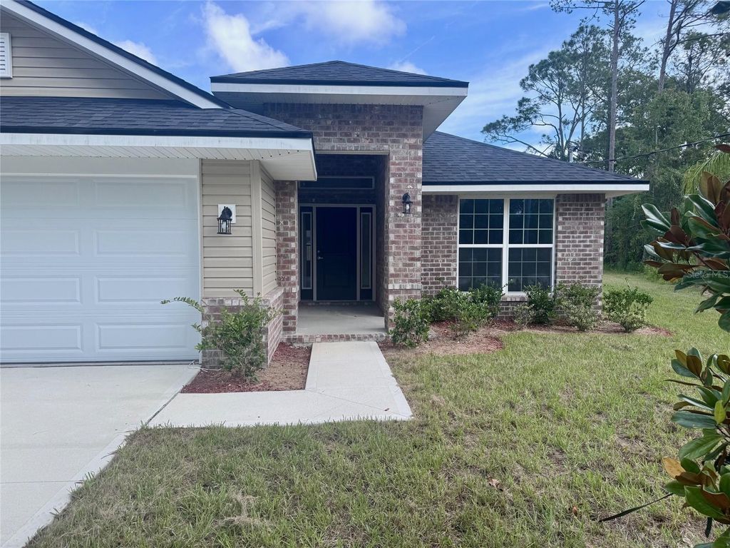 Photo of 82 Bayside Dr, Palm Coast, FL 32137 (MLS # FC310552)