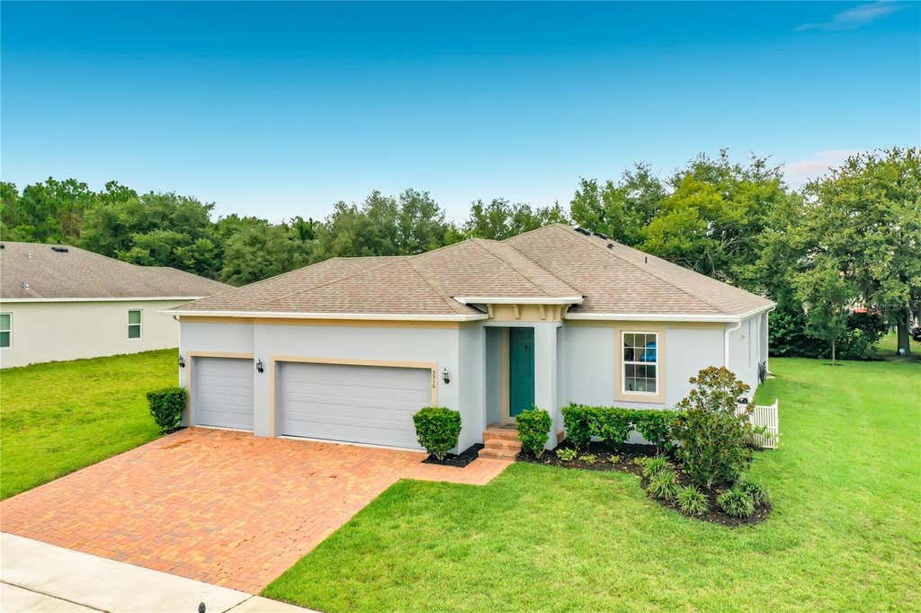 Photo of 5516 Windsong Oak Drive, Leesburg, FL 34748 (MLS # O6430490)