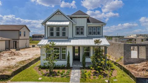 Photo of 9819 Gobat Alley, Orlando, FL 32827 (MLS # O6269343) Photo of 9819 Gobat Alley, Orlando, FL 32827 (MLS # O6269343)