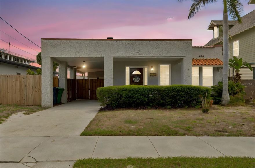 Own a piece of Tampa history with this charming 1920s Mediterranean-style home, rich in character yet thoughtfully updated for modern living. Showcasing Tampa’s iconic Spanish Mediterranean architecture, the home welcomes you with a quintessential covered front porch and timeless curb appeal. You will find covered parking with access to both the front and side entry doors, ideal for the Florida rainy season. 

Inside, you’ll find freshly painted interiors complemented by beautifully refinished original heart-of-pine hardwood floors in the front living spaces, preserving the home’s historic warmth. The updated kitchen features stainless steel appliances, gas range and new quartz countertops. The guest bathroom has been tastefully renovated. A light-filled third bedroom with French doors offers flexibility as a home office or studio. The spacious 19x10 laundry/bonus room provides endless possibilities—ideal for a gym, or additional living area. 

Step outside to enjoy a 240 sq ft covered side patio overlooking a serene brick-paved courtyard with a relaxing water feature—perfect for entertaining or unwinding. Major updates include a 2022 roof and a 2019 HVAC system and newly rebuilt back deck. The detached oversized storage building matches the home and ready for you for the next owners vision for this space. The property sits on a 54x100 lot (5,400 sq ft), zoned RM-16 (residential multi-family) in the desirable Mitchell/Wilson/Plant school district.

Located in Armory Gardens—one of South Tampa’s fastest-growing neighborhoods—this home is on a sidewalk-lined street and in Flood Zone X (no mandatory flood insurance). Enjoy a walkable lifestyle just minutes from Villa Brothers Park, the JCC, and close to local favorites like Alessi Bakery, Psomi, Acropolis, and Miguel’s. Midtown Tampa, University of Tampa, Downtown, the Riverwalk, major hospitals, MacDill AFB, and Tampa’s championship sports venues are all nearby, with Gulf Coast beaches just a short drive away.
This is a rare opportunity to own a historic gem in the heart of South Tampa.