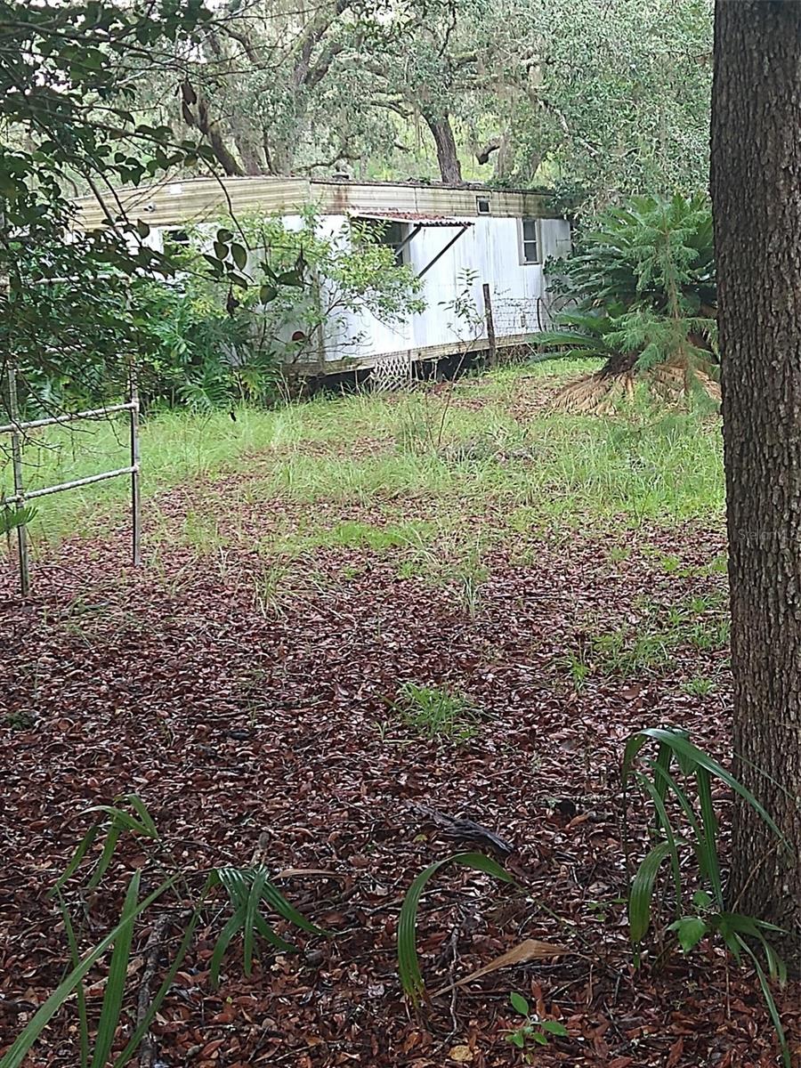 Mobile home located on 10 acres in Marion County.