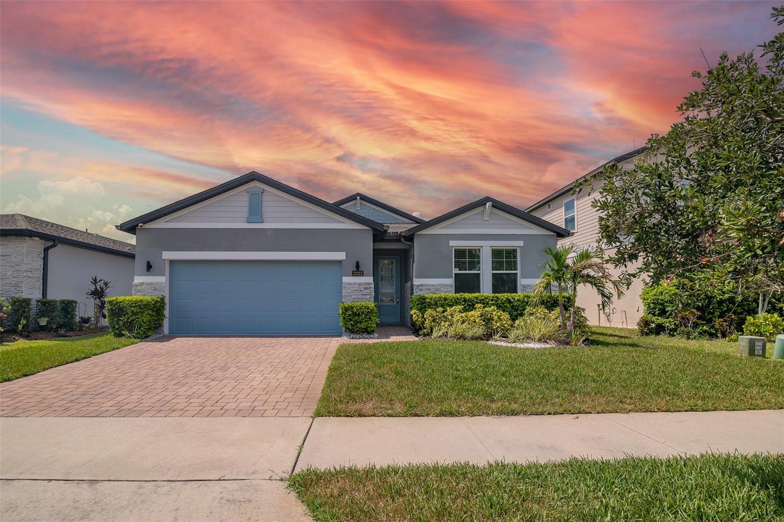 Welcome to your dream Home! This stunning and elegant single-story home, built by Meritage Homes in the gated community of Hawk's Crest in Winter Park, includes numerous upgrades. This is the Pomelo model, equipped with an upgraded kitchen package that includes built-in double ovens and a stainless steel range hood. Beautiful quartz countertops feature an oversized kitchen island with excellent space for family gatherings. Other features include a walk-in pantry and fantastic lighting. The luxurious kitchen integrates with the dining and living areas. The dining area is enhanced by a screened-in deck overlooking a pond. The backyard features a new, large, extended patio for entertaining. The master bedroom has an ensuite bathroom with a double vanity, a small closet, and a large walk-in closet that can be customized for a future owner. The home also comes with new gutters. Other amenities in the Hawk's Crest community include a resort-style pool with a clubhouse, a splash pad, a fitness center, barbecue grills, playgrounds, a dog park, and a community fishing pier with views and access to beautiful Lake Howell. Nearby, you'll find shops, restaurants, and specialty physicians such as Kelly's Ice Cream, Foxtail Coffee, Sobol, Winter Park Pediatric Dentistry, and the Park Maitland Preschool Campus, along with excellent schools in the area. Enjoy a short drive to Downtown Winter Park, with its extensive dining and shopping options. Hawk's Crest is also very close to Rollins College and UCF. Schedule your private tour today!