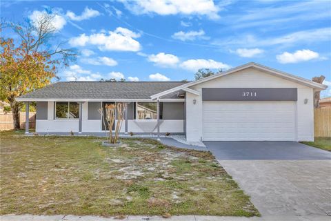 Photo of 3711 Pipes O The Glen Way, Orlando, FL 32808 (MLS # S5140438)