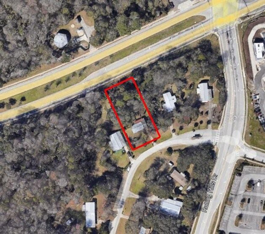 Located on a half-acre lot with frontage on busy SR 207, this property offers strong visibility and future commercial potential. A county letter on file supports rezoning to commercial, making it well-suited for office, coffee shop, fast food, or other retail uses. Positioned in the established Fox Hill Estates area, the site is minutes from shopping, dining, and entertainment, providing flexibility for owner-users or investors seeking growth along a high-traffic corridor.