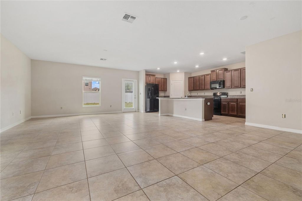 Photo of 7407 Rosy Periwinkle Court, Tampa, FL 33619 (MLS # TB8502011)