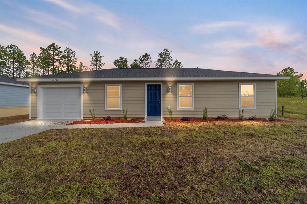 Photo of 24402 NW Aspen Lane, Dunnellon, FL 34431 (MLS # OM720744)