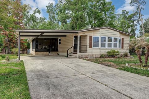 Photo of 3033 Myakka River Road, Tavares, FL 32778 (MLS # V4948619)