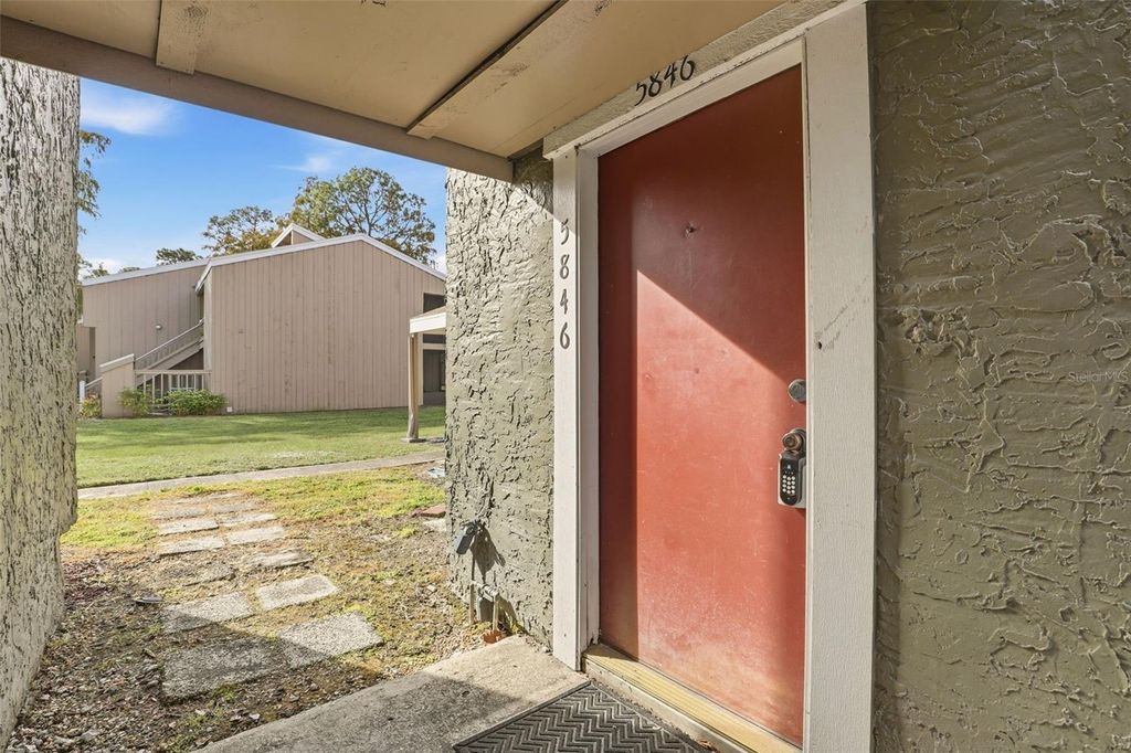Photo of 5846 Peregrine Ave #B12, Orlando, FL 32819 (MLS # O6368369)