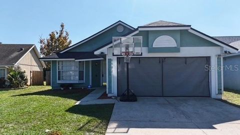 Photo of 6582 Meritmoor Circle, Orlando, FL 32818 (MLS # O6330532)