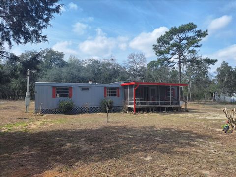 Photo of 150 NE 139th Terrace, Williston, FL 32696 (MLS # OM720683)