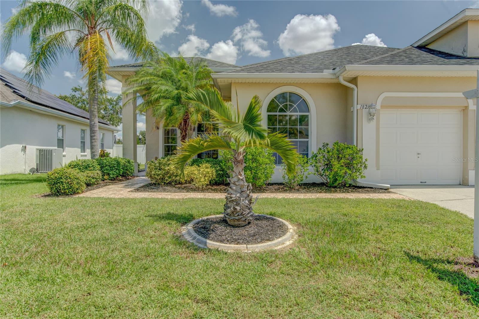 Move-In Ready 4BR/2.5BA, Saltwater Pool Home with 3-Car Garage & Flexible Floorplan! Welcome to this beautifully maintained home featuring a screened, heated saltwater pool and spacious covered lanai, perfect for year-round outdoor living. The home sits on a fully fenced lot with extensive landscaping, paved walkways, and gutters, offering privacy and curb appeal. Inside, enjoy a popular split-bedroom layout with formal living and dining rooms, plus a generous family room adjacent to the kitchen—ideal for gatherings and entertaining. The kitchen is fully equipped with appliances and showcases 42" natural oak cabinets, bisque finishes, a built-in desk, and a sunny breakfast nook overlooking the pool and family room. Recent Upgrades & Features: Roof (2020) with water/ice barrier and solar attic fans. Laminate flooring in the primary bedroom and bathroom. New water heater (2024). Freshly painted pool deck (2024). Lanai rescreened (2025). Garage door maintenance performed (2024), including new springs. New toilets and shut-off valves (2024). Bike rack installed in garage (2023). Interior highlights include tile flooring in common living areas, Berber carpet in secondary bedrooms, and a primary suite featuring a tray ceiling, 2 walk-in closets, and a luxurious garden bath with soaking tub and separate shower. The versatile fourth bedroom/den has double French doors, a closet, and direct access from the foyer— perfect as a home office, study, or guest room. Additional amenities include: 3-car garage, Fenced yard beyond the pool area, Ceramic tile flooring in common areas, Flexible layout ideal for families or work-from-home needs. This home is ready for immediate occupancy—don’t miss your chance to own this exceptional property!