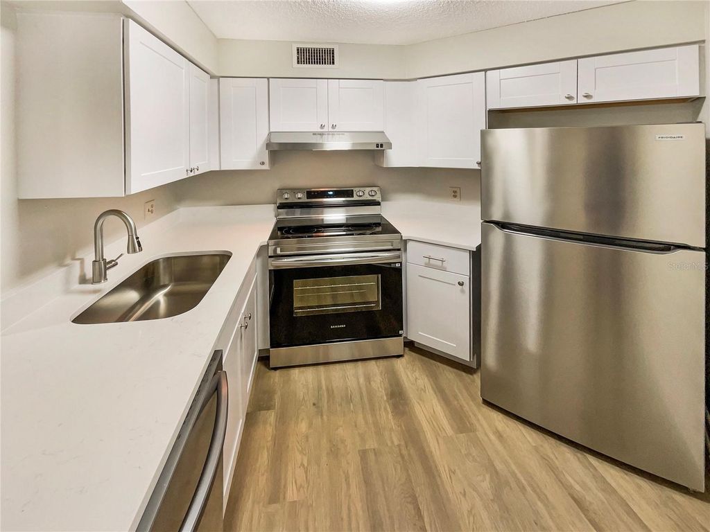 Photo of 3715 Atrium Drive #3, Orlando, FL 32822 (MLS # O6365458)