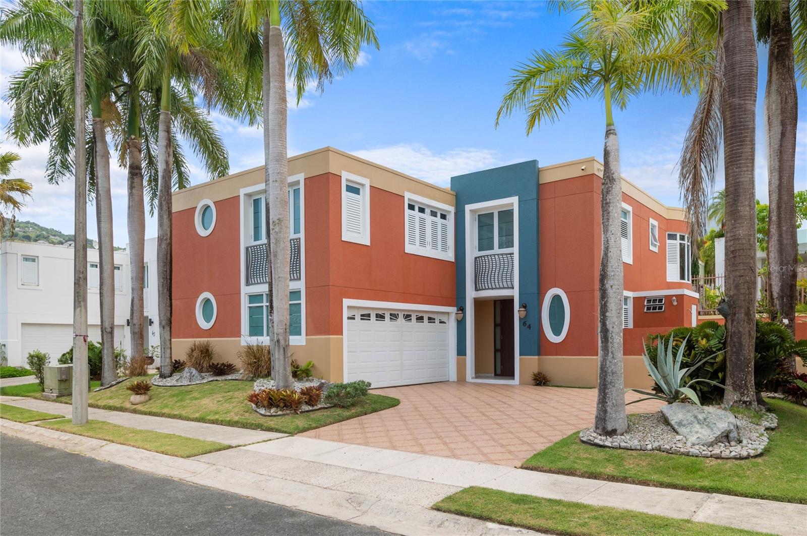 This elegant property is located in Hacienda San José, an exclusive and family-friendly community in Caguas. It offers 4 bedrooms, 3 full bathrooms, 2 half bathrooms, an open kitchen layout with quartz countertops, two open outdoor terraces, and a relaxing swimming pool, all situated on a 515 sqm lot with approximately 2,800 sqft of living space.
The primary bedroom features a walk-in closet and a spacious bathroom with a jacuzzi, shower, and double vanity. All other bedrooms include en-suite bathrooms, with two sharing a convenient Jack and Jill configuration.
The sale includes: solar water heater, stove, refrigerator, 22k diesel generator with a 110-gallon tank, automatic transfer switch, washer-dryer combo, air conditioning units throughout the home and a 600-gallon cistern with industrial pump.
Hacienda San José offers resort-style amenities: swimming pool, gym, clubhouse, tennis courts, beach tennis courts, soccer, basketball, volleyball, playgrounds, restaurant, and double controlled access.