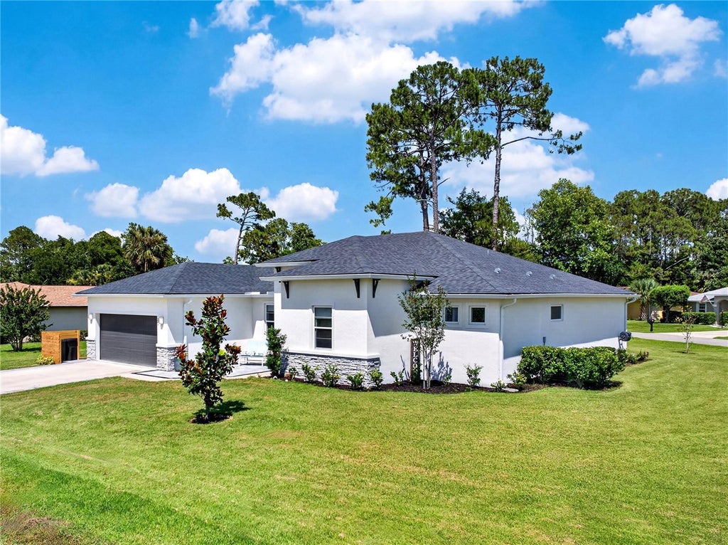 Photo of 217 Beachway Drive, Palm Coast, FL 32137 (MLS # FC319481)