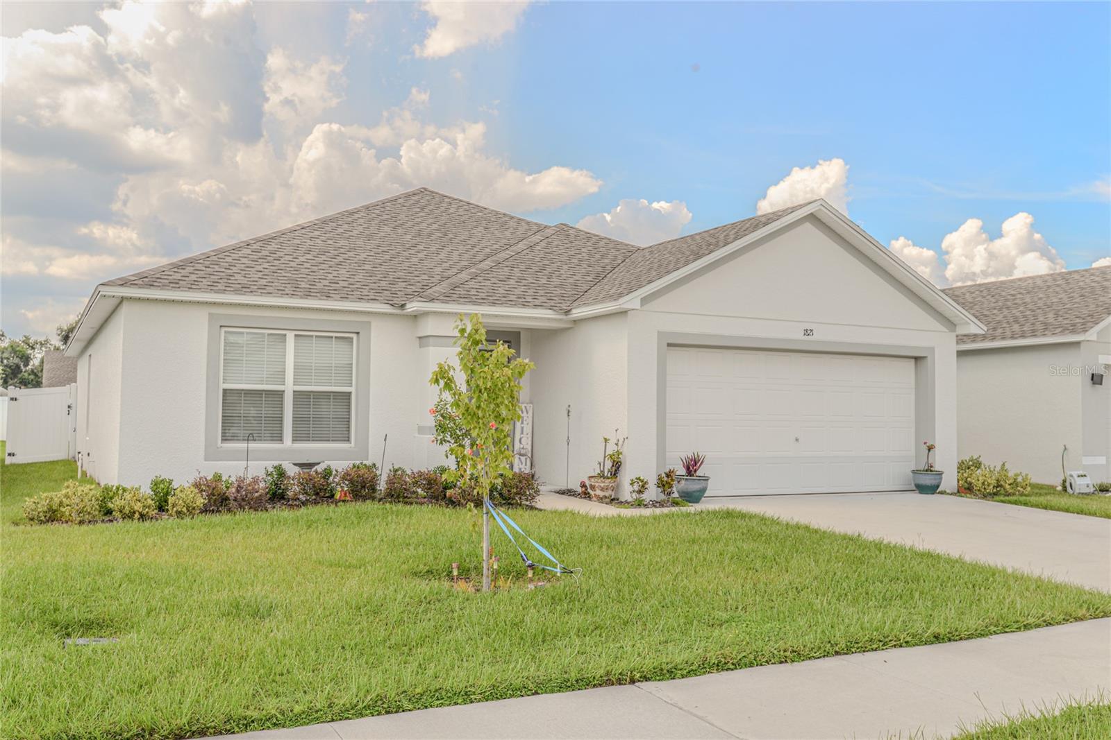 *** SELLER OFFERS TO PAY ON BEHALF OF THE BUYER***, an interest rate Buy-down to 4.5% for a 2-year period at an end interest rate at 6.125% FHA loan. This home also qualifies for USDA financing "excluding the Seller contributory Buy-down offer". USDA financing allows for no down payment financing however at the current market interest rate. If you opt to take advantage of this Seller's Buy-down Rate Offer, this means you don't have to wait for the rates to come down while obtaining a lower monthly payment - AND WHY WAIT for the builder to take 6 TO 8 months for builder completion of a new home when I can get you into this 1 year old like new home that includes many upgrades and add-ons that the builder will build-up the price on you to match this home!!! Don't pass up this opportunity to buy this HIGHLY DESIRABLE Southern Homes Newport A model plan - this home offers 1,447 S.F. of living area with the most spacious and functional open Great-room floor plan, perfect for modern living and features the following: 3 Bedrooms and 2 Bathrooms. An open living area that integrates into the kitchen, dining and gathering in the Great Room, creating a seamless flow for entertaining and everyday life. Kitchen includes 36” upgraded cabinetry. Stainless Steel Appliances provide durability with modern convenience, a closet pantry and spacious counter-height island makes for a great area for meal prepping and organizing a breeze. Flooring & Design includes Luxury Large Rectangular Tile in the Great Room, Kitchen, Entry and both bathrooms for both elegance and durability. Stain-resistant carpet in the bedrooms for added comfort and practicality. The En-Suite Bath is a true retreat with a walk-in glassed shower stall abutting the upgraded Garden Bath with a long-neck spout and dual vanity sinks. A extra large vinyl fenced back yard for added privacy and convenience for you, your family and pets. Additional Features include: a 2-car garage for parking with clean landscaping. Architectural shingles on the roof. Energy-efficient insulation and windows, ensuring comfort year-round. This home offers a perfect blend of luxury, comfort, and practicality with an open, spacious design. Buy-down cost to Seller shall not exceed $6,788. Call today to view this home!
