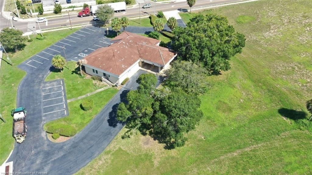 Photo of 695 N Scenic Highway, Frostproof, FL 33843 (MLS # L4944253)