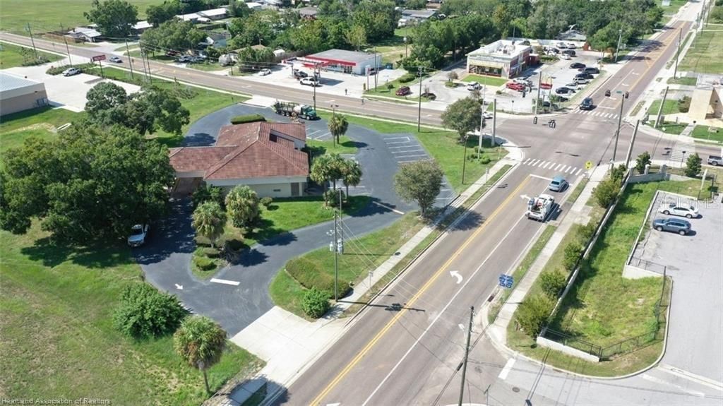 Photo of 695 N Scenic Highway, Frostproof, FL 33843 (MLS # L4944253)