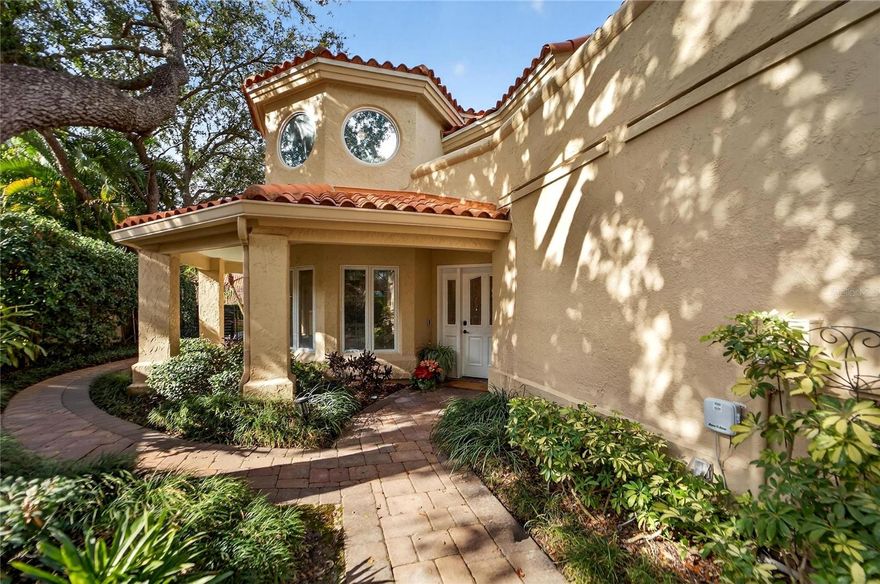 Welcome to this stunning townhome, located within Tampa Bay’s premier guard-gated,  golf and country club, Avila.  Beautifully updated throughout, this exceptional residence offers 2,838 square feet of air-conditioned living space, featuring three bedrooms, two and a half baths, a private home office, sunroom, and a two-car garage. Upon entry, the home is filled with natural light, while soaring ceilings enhance the open and inviting floor plan. The living room showcases a dramatic coffered ceiling, a striking fireplace, and an adjoining wet bar—perfect for entertaining. The updated kitchen is equipped with newer stainless steel appliances, including a refrigerator, dishwasher, range, and microwave, and opens to a cozy dinette ideal for casual dining and morning coffee. French doors from the living room lead to the Sunroom which is the perfect place to relax and unwind. Outside, you will love the patio which has been beautifully updated with landscaping and brick pavers. It is the perfect place to enjoy the Florida sunshine. The spacious first-floor owner’s retreat has been thoughtfully updated and features a luxurious spa-inspired bathroom, creating a serene and private sanctuary. Upstairs, you’ll find two generously sized guest bedrooms and a beautifully appointed full bathroom, providing comfort and privacy for family and visitors alike. The 2nd floor is complete with your private home office. The thoughtfully designed floor plan offers seamless flow for both everyday living and entertaining. This townhome is located within the Garden Villas of Avila which provides access to your private swimming pool for residents. This is such an amazing opportunity to live in Avila where luxury, comfort, and lifestyle come together effortlessly.