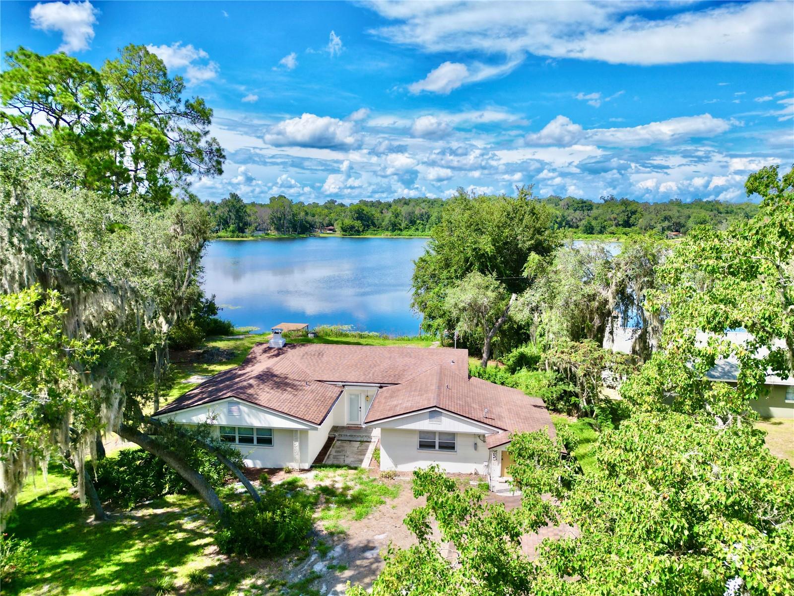 Look no further for your perfect lakefront getaway retreat on Little Lake McMeekin. Enjoy a beautiful and serene setting away from the noisy world or capitalize on an amazing Air BnB opportunity. Strong ROI potential. New drain field. 7 year old roof.This 3 BR 2 BA home offers an open floor plan, large updated kitchen with island for entertaining and beamed ceilings. 1710 square feet with fireplace and a large master suite.This lovely home sits on an .96 acre with 130 feet of lakefront.The property includes a detached garage as well as a storage shed. Electrical AND Plumbing updates in 2024. Updated bathrooms.Launch your boat from the backyard and enjoy fishing and swimming. 2 docks 1 new and one older with boat slip. Culligan water softener. Large rear deck.Detached 23X16 building for storage and 1 car garage with workshop. This is a beautiful property with a park like feel.