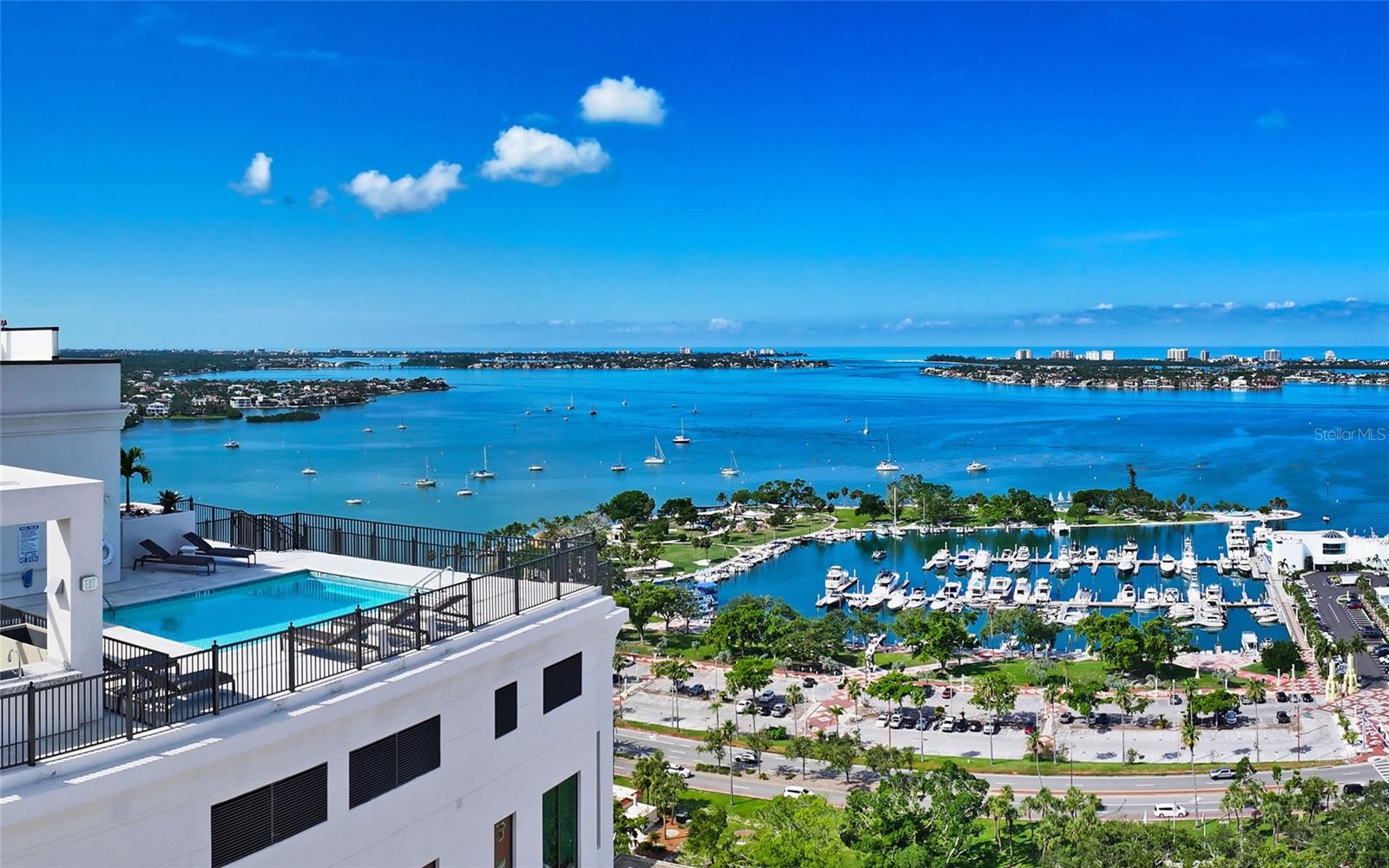 Penthouse Collection residence on the 16th floor of the newly-built DeMarcay, offering
sky-high views of the city, Sarasota Bay, Big Pass, and beyond to the Gulf. Best location in the
city by the intersection of Main Street and Palm Avenue. Walk to art galleries, restaurants,
boutiques, theaters, farmers’ market, city marina, wellness services, live music, and all
downtown Sarasota amenities. Only three miles over the Ringling Bridge to St. Armands
Circle and Lido Beach. DeMarcay stands alone in Sarasota for raising the amenities and pool
to such impressive heights. Residents have exclusive access to a state-of-the-art fitness
center and club lounge, as well as an outdoor kitchen, sparkling pool and expansive bi-level
terrace on the 18th floor, providing 360-degree vistas of Sarasota’s breathtaking scenery.
Located on the 16th floor bayside, this elegant 3,407-square-foot residence has three
private bedroom suites, an office/den, a powder room, an open living area, laundry facilities,
and a private bayfront balcony. Volume ceilings and large windows maximize views and
natural light throughout. The gourmet kitchen showcases imported Italian cabinetry, quartz
countertops, a Miele five-burner gas cooktop, and seamlessly integrated Miele appliances.
The primary suite offers a spa-inspired ensuite bath featuring designer Italian cabinets,
porcelain undermount sinks, an elegant soaking tub, and a spacious walk-in shower.
Residents enjoy 24/7 access to dedicated on-site staff for personalized services.
The DeMarcay is an 18-story boutique condominium community of only 39 residences
that uniquely blends modern luxury with Sarasota’s rich history. The development
thoughtfully preserves and restores the historic facades of the original DeMarcay Hotel, built
in 1922, and the Roth Cigar Factory, which operated from 1923 to 1938. This fusion of historic
charm and contemporary design creates a distinctive living experience. Live the good life at
DeMarcay — luxurious and casual — so Sarasota!