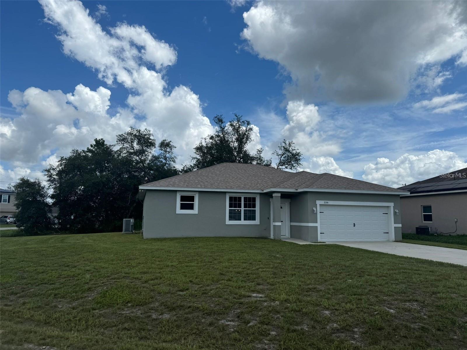 Beautiful home in Poinciana. This beautiful home features living/heated area with Four bedrooms, three full bathrooms , open, bright and airy floor plan, this home features 9,2 high ceilings, tile throughout (no carpets) granite counter tops in kitchen and all bathrooms, garage with opener, tiled showers large double walk-in closet in master bathroom, wood cabinets with soft close drawers and doors.