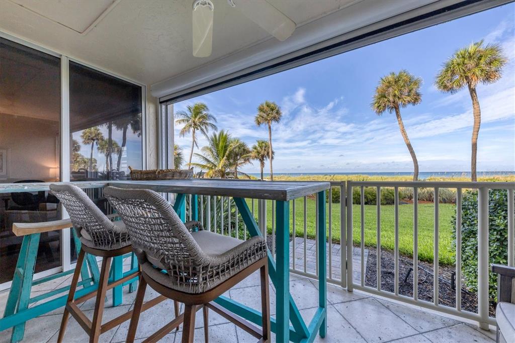 Gorgeous Gulf front, turnkey furnished rental in Tiffany Plaza. Walk out to the beach from this lovely updated and exquisitely furnished 2 bed/2 bath condo. Coastal inspired décor, king bed in the primary bedroom, full bed and day bed with trundle in the second bedroom. Smart TV's and Wi Fi make this the perfect winter retreat! Tiffany Plaza offers a sparkling heated pool, club room with sauna, and you have a covered parking spot with plenty of guest parking. This Steller location is a short drive to fine dining and shopping venues, or take the free Trolley to St. Armand's Circle, downtown Sarasota, Lido and Siesta Key. December 2025 and January 2026 $8000 per month, February is $10,000 and March and April are $12,000. May through November are $5500 per month. Please note that seasonal and off-season rates are plus taxes and fees.
