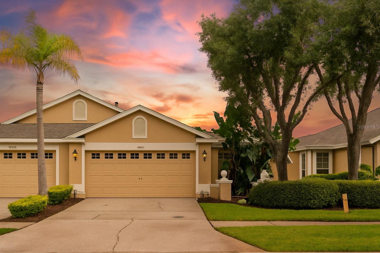 This one-story villa combines thoughtful updates, maintenance-free living at low HOA, and low CDD ($796/year) included in property taxes, and a welcoming community! It features 3 bedrooms, 2 full bathrooms, and a 2-car garage. Tucked away in a tranquil setting with private pond views, it is located within the sought-after "gated" West Meadows community in the heart of New Tampa. Offering a truly lock-and-leave lifestyle, this home is ideal for frequent travelers, first-time buyers, retirees, or those seeking the perfect winter retreat.
Step inside to discover thoughtful upgrades throughout. The kitchen boasts soft-close cabinetry, quartz countertops, a new sink, and stainless-steel appliances (refrigerator 2023, microwave 2024). Bathrooms include updated faucets and toilets, while bedrooms feature modern flooring. NO CARPET. Crown molding in the main living areas adds elegance, and handicap-accessible safety bars provide peace of mind.
Enjoy serene pond views from the extended, covered, and screened lanai—the perfect spot for morning coffee or evening gatherings. Additional updates include pathway lighting, upgraded blinds, improved sliding door rollers, and abundant garage shelving.
Living here means maintenance is handled for you: the HOA ($326/month) covers lawn care, irrigation, exterior painting, and even the roof. Residents of Audubon Landing enjoy their own private community pool while also having full access to the West Meadows Community Center, with multiple pools (lap pool & waterslide), tennis & pickleball courts, basketball & volleyball, fitness center, playgrounds, walking trails, and a dog park.
Conveniently located near major highways, top-rated hospitals, shopping, and dining—just minutes to Publix, Target, Walmart, ALDI, Sam’s Club, and the Tampa Premium Outlets, with quick access to Downtown Tampa, Tampa International Airport, Gulf Coast beaches, and even Disney World.